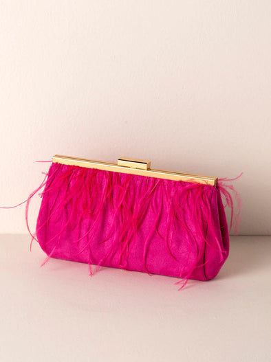 pink purse with ostrich feathers