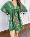 green embroidered dress
