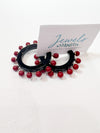 red and black hoop earrings