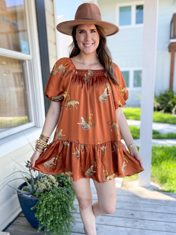 brown dress with leopards