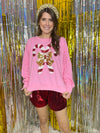 pink sweatshirt with sequin candy canes