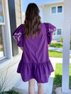 back of short purple dress