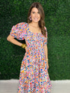 Close up of smocked multi pattern dress