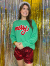 green sweatshirt with red merry 