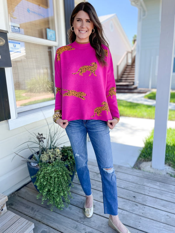 pink sweater with cheetahs 