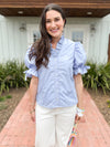 blue top with ruffle sleeves
