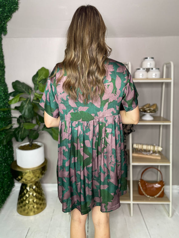 back of green floral dress