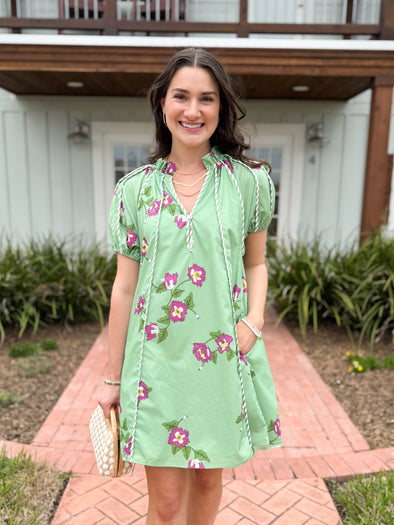 green dress with floral print 
