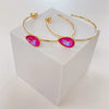 gold hoop with pink stone 