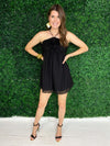 black halter neck romper with flower detail 