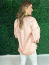 back of light pink long sleeve top 