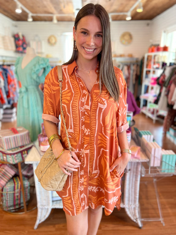 orange patterned shirt dress