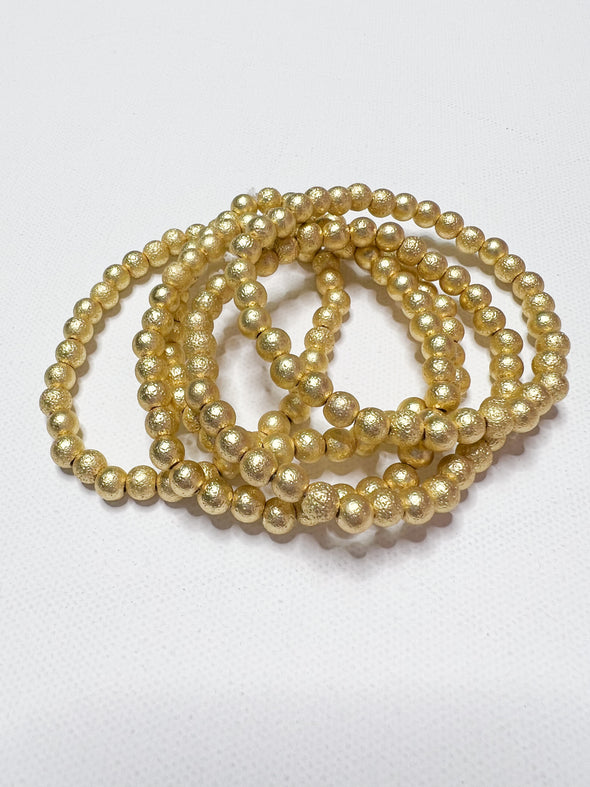 Gold textured stackable ball bracelet 