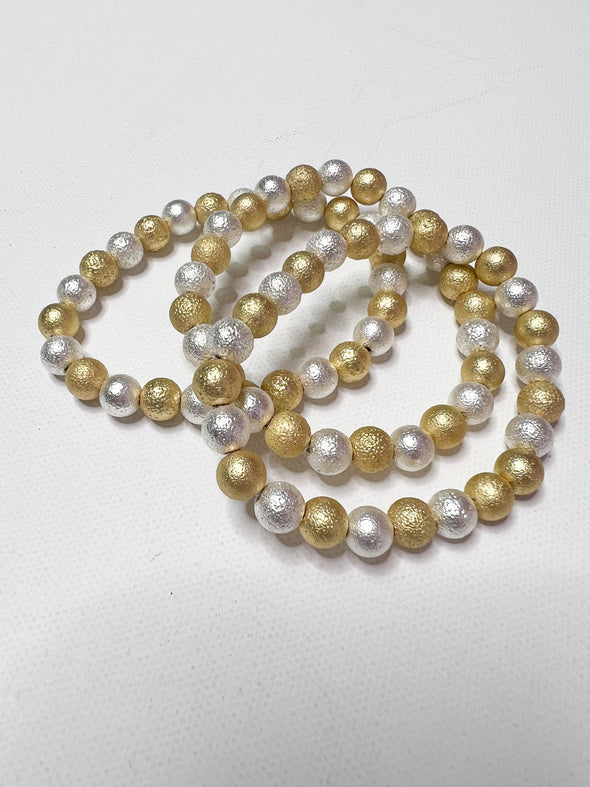 Silver and gold textured stackable ball bracelet 