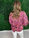 back of purple floral top 