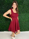Side view of short maroon dress