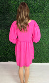 back of oversized pink dress