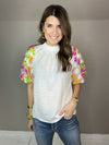 white thml top with sequin sleeves